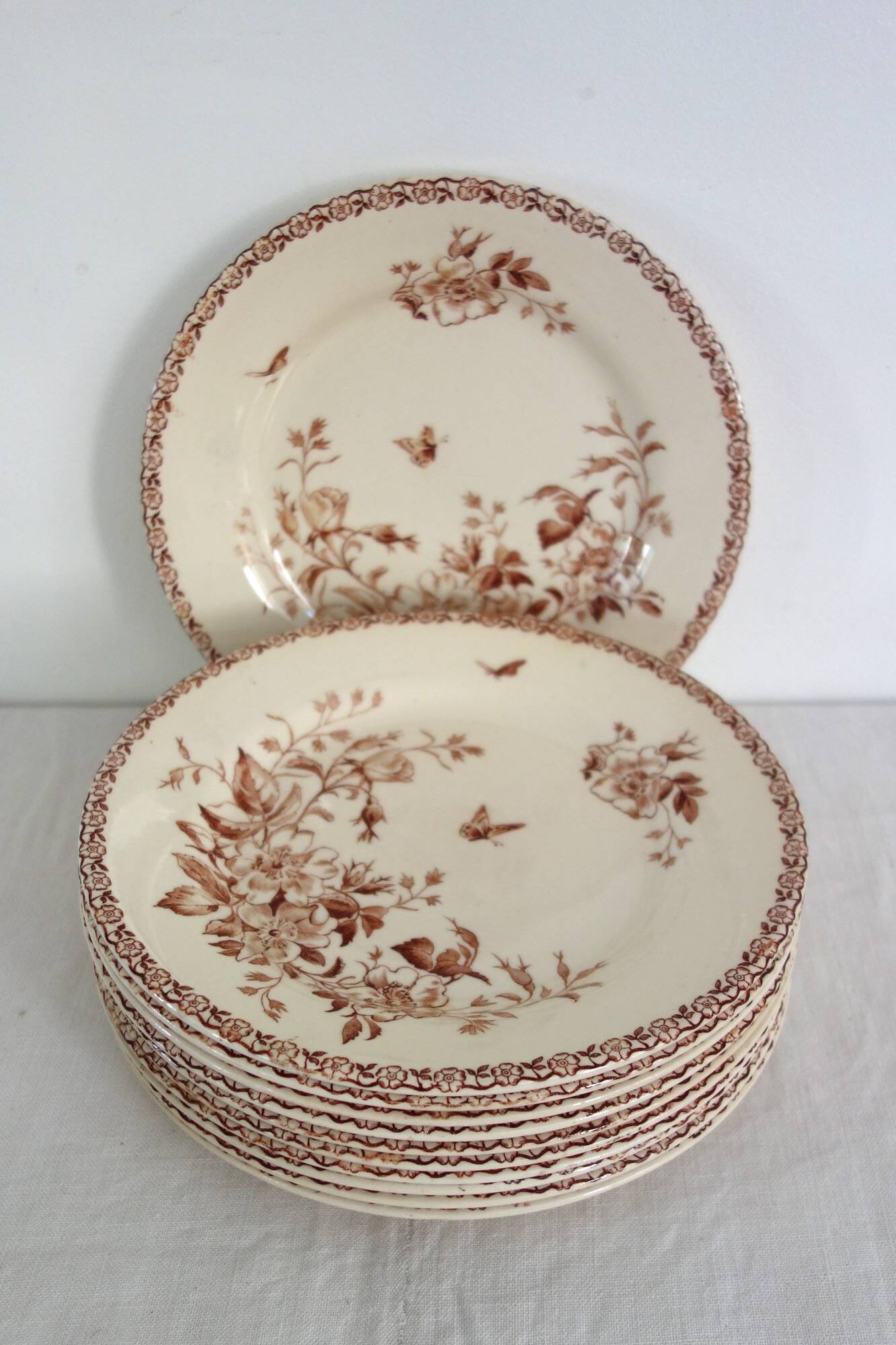 11 flat plates Terre De Fer Gien model Mai circa 1900