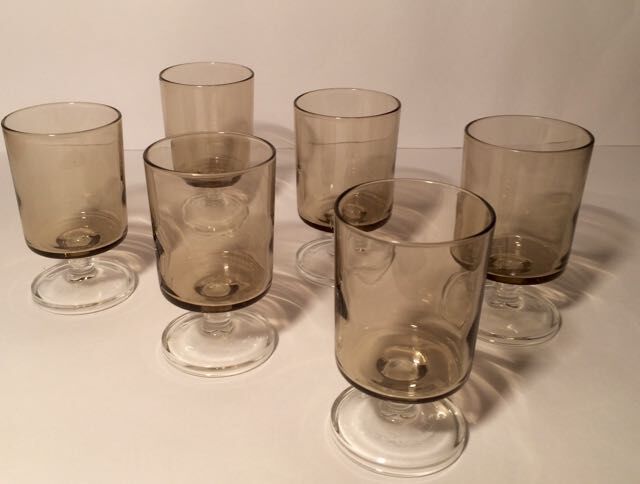 Series of glasses with smoked glass feet
