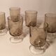 Series of glasses with smoked glass feet