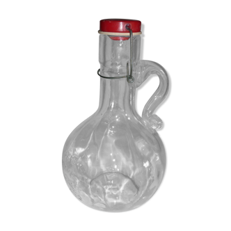 Bottle with handle and mechanical cap