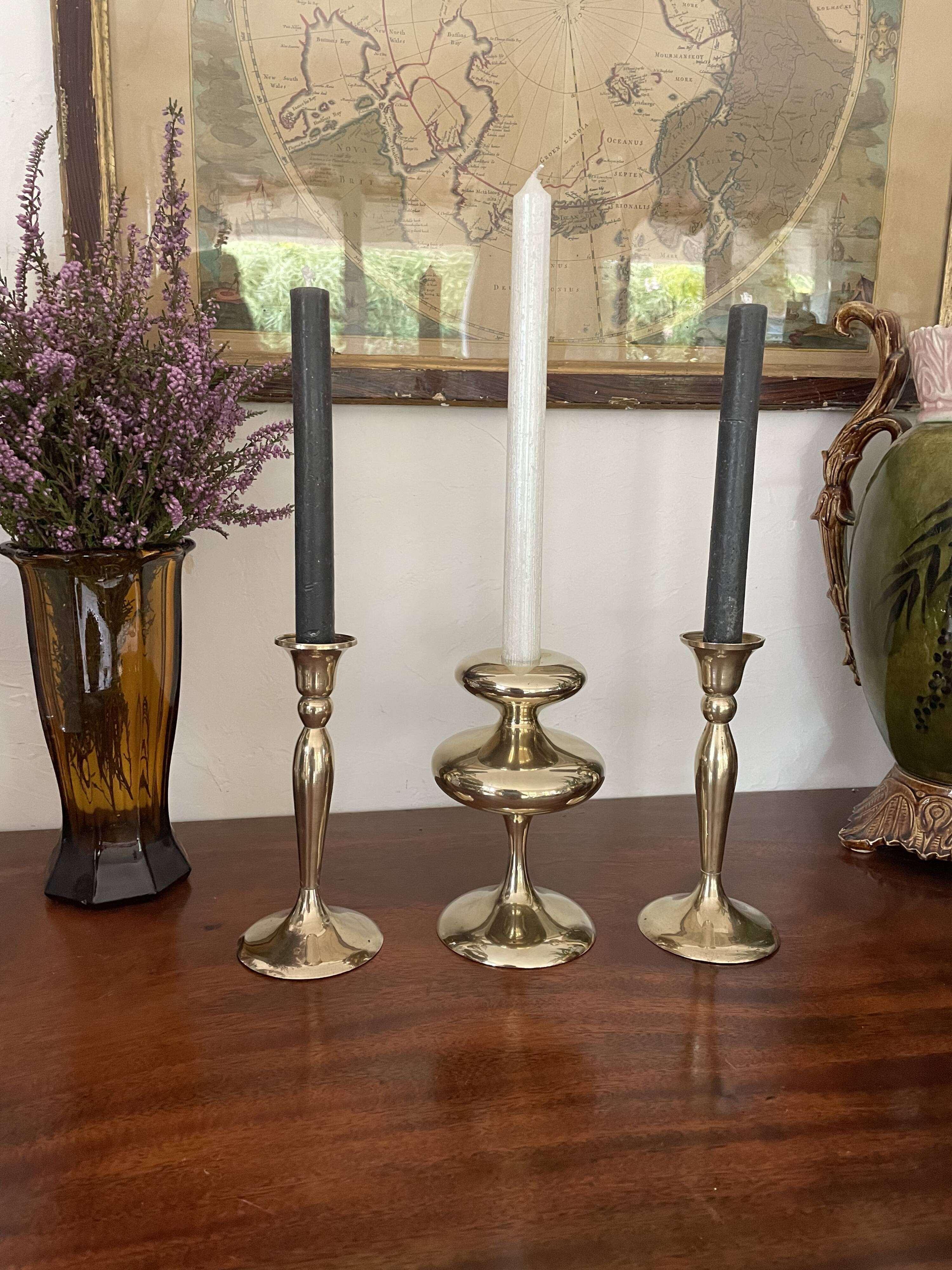 Three vintage brass candle holders