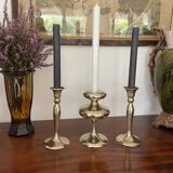 Three vintage brass candle holders