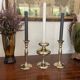 Three vintage brass candle holders