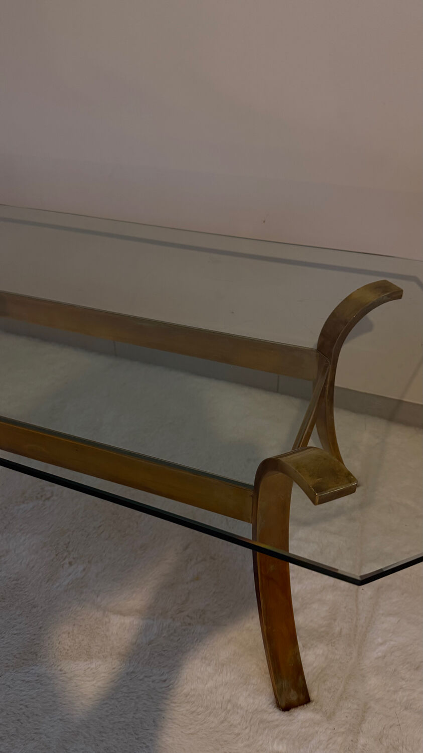 Gilt brass console table with glass top by Jacques Quinet