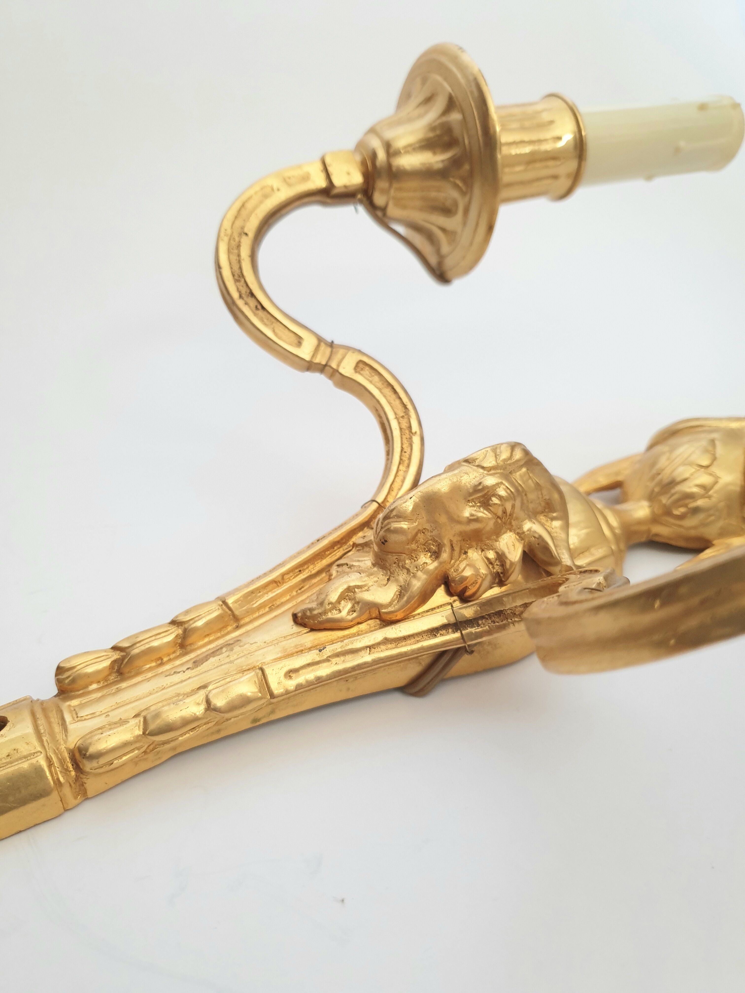 Paire d'applique de style Louis XVI  XXe bronze doré belier