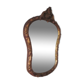 Old mirror in wood and stucco dorè