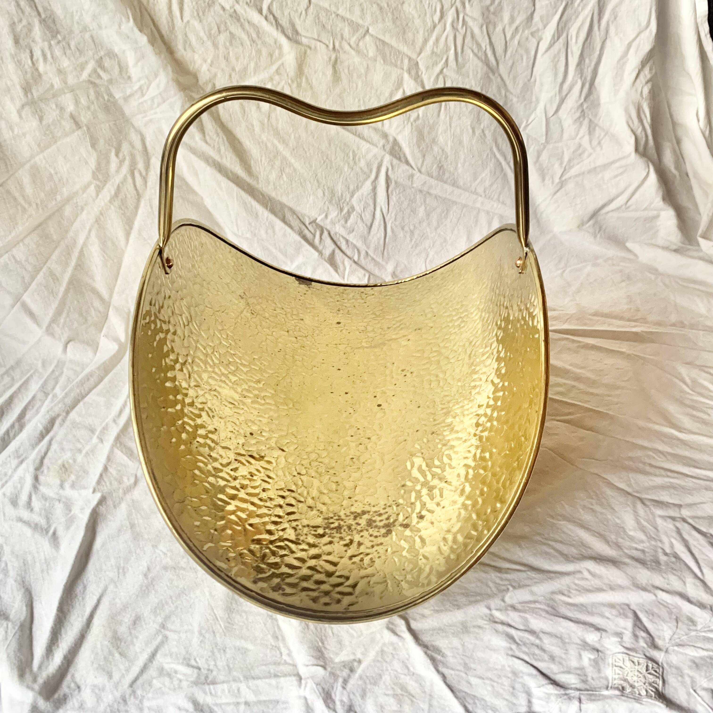 Vintage hammered brass log holder