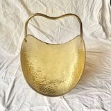 Vintage hammered brass log holder
