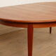 Vintage round dining table | extendable | teak | 125 - 185 cm