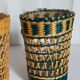 Four long drink glasses in vintage woven rattan cases