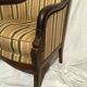 Fauteuil bergère aux dauphins époque Restauration
