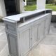 Grey lacquered wooden bar cabinet, golden brass bar