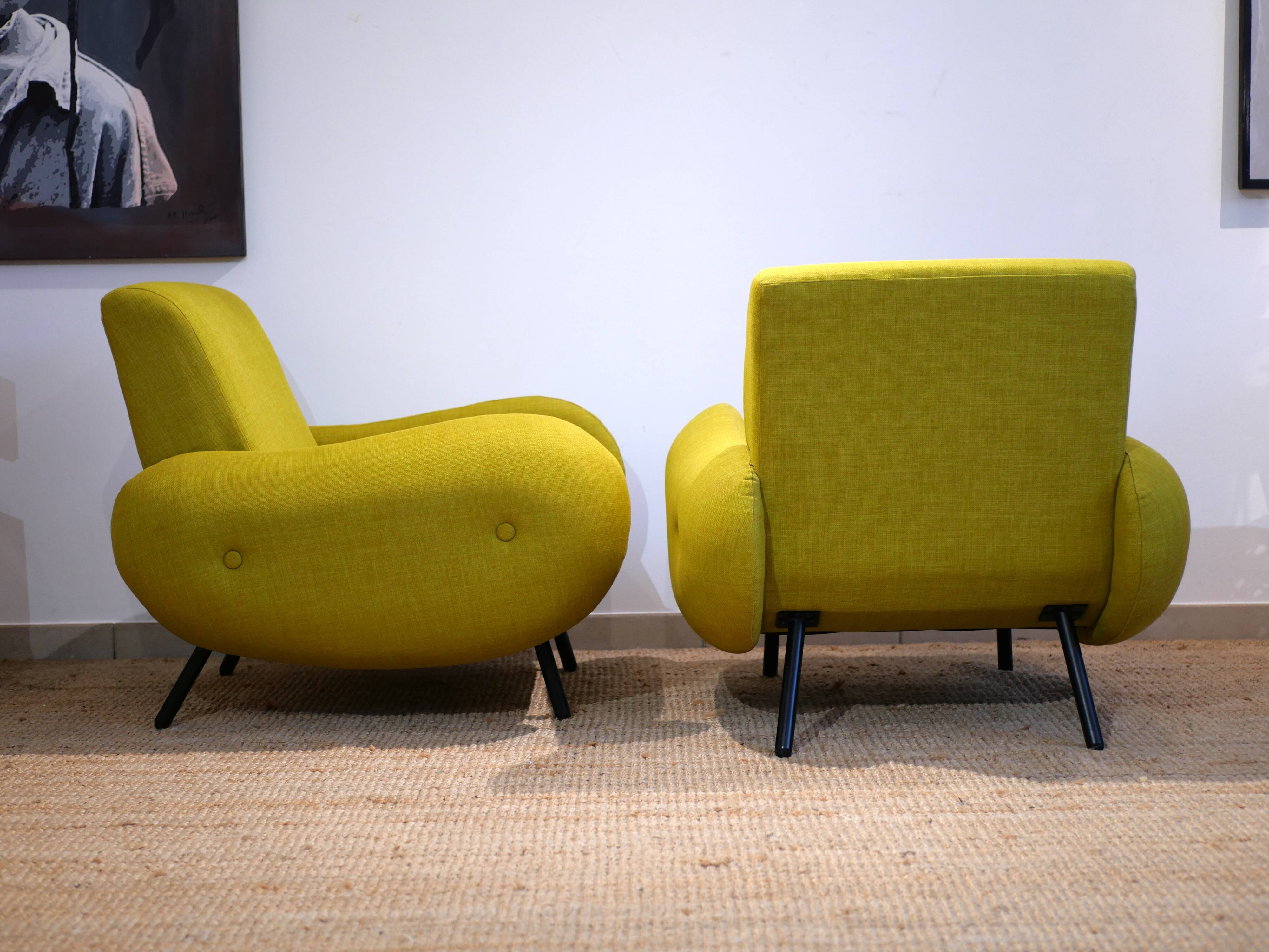 Pair of low armchairs in 60s–70s style