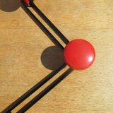 vintage black and red iron coat rack
