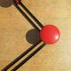 vintage black and red iron coat rack