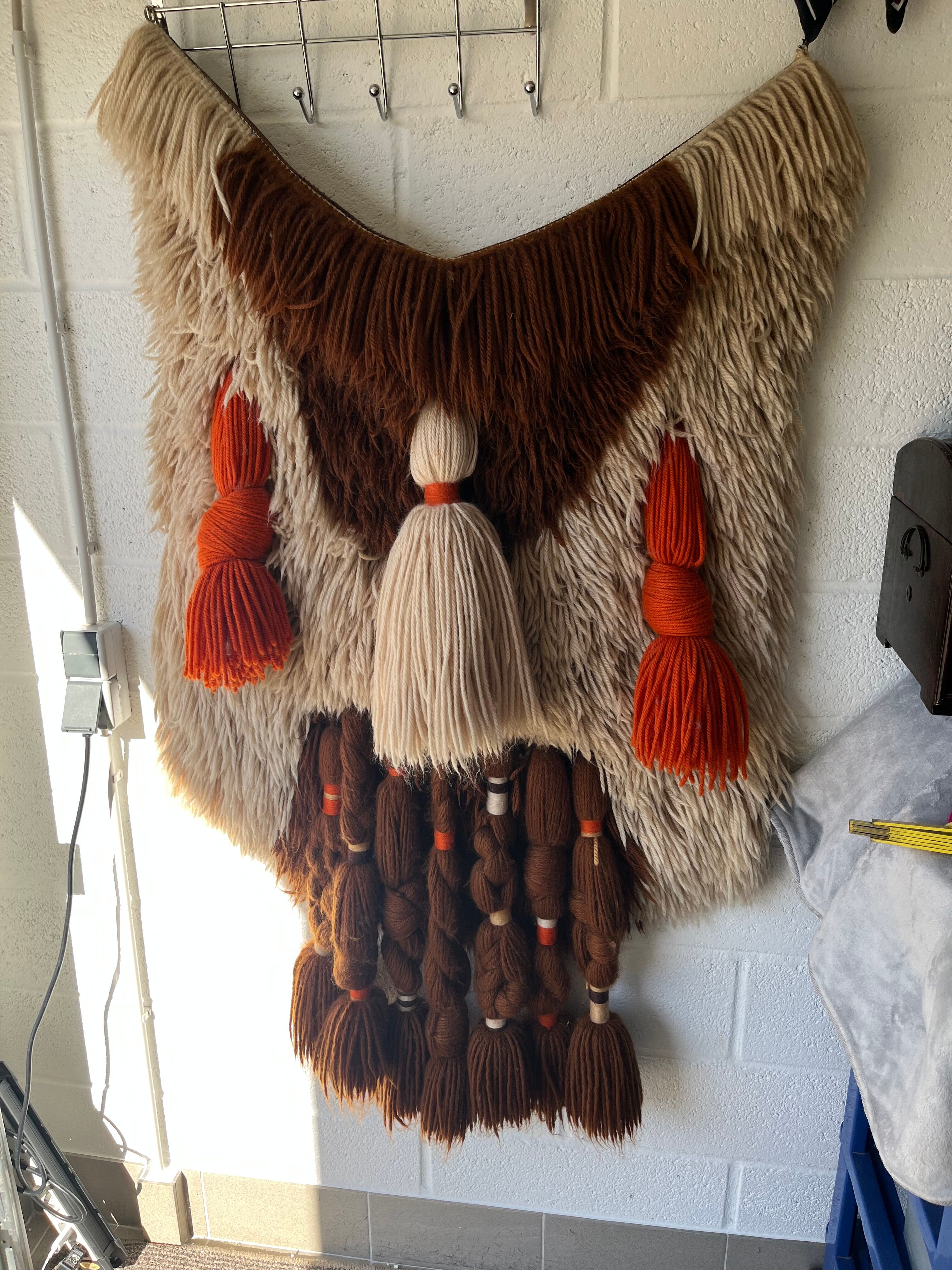 Handmade woven wool wall tapestry from the 70s and 80s, vintage macramé.