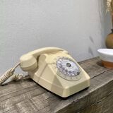 Vintage beige rotary telephone