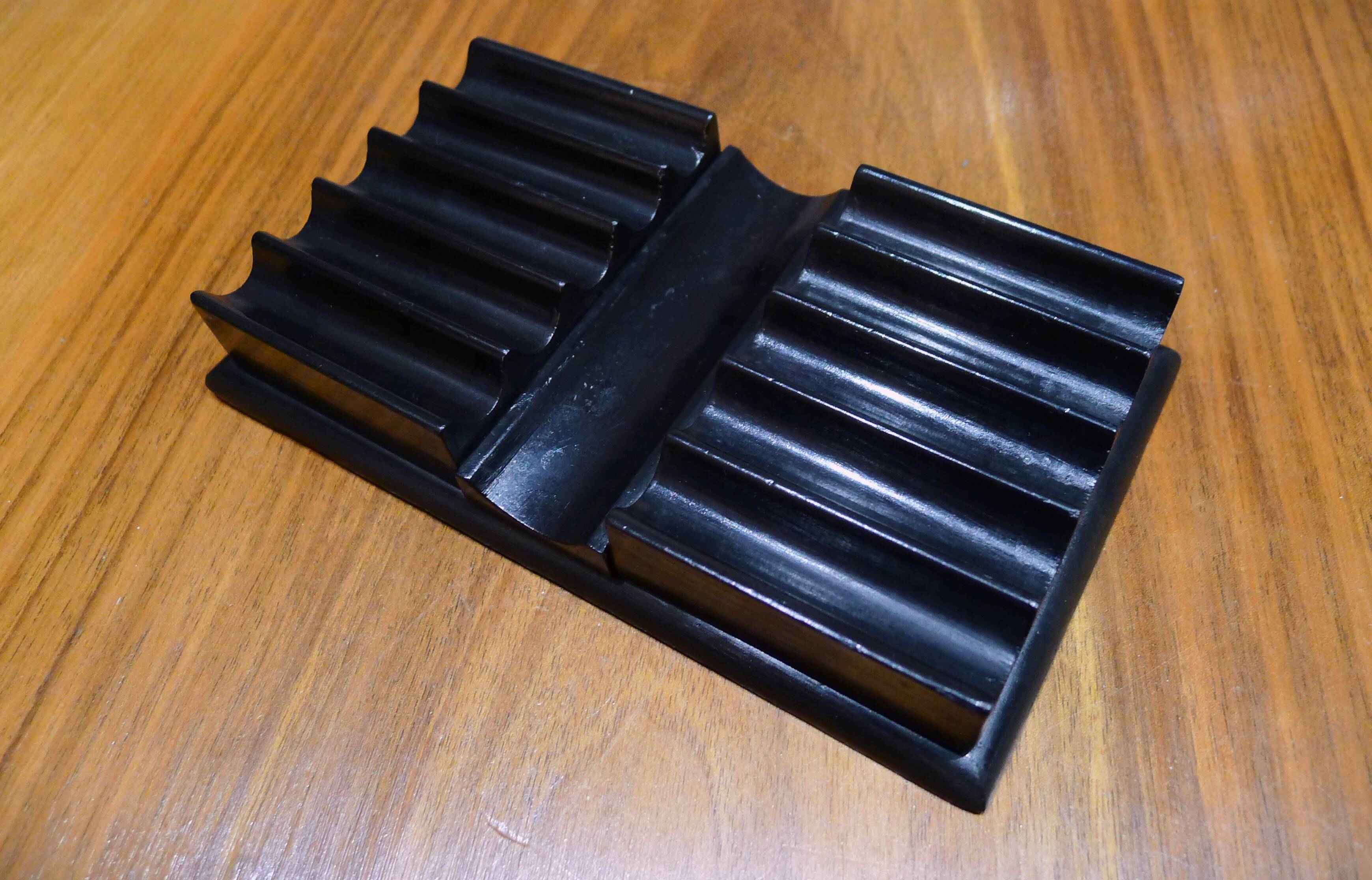 Old pen holder in black wood