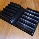 Old pen holder in black wood