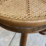 Bistro chair with a curved wooden frame and caned seat from the 1930s.