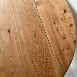 Round wooden table with flaps