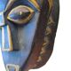 Masque africain en bois sculpté bleu et doré, oreilles de lion