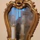 Vintage gold mirror sconces from the late 1950s.