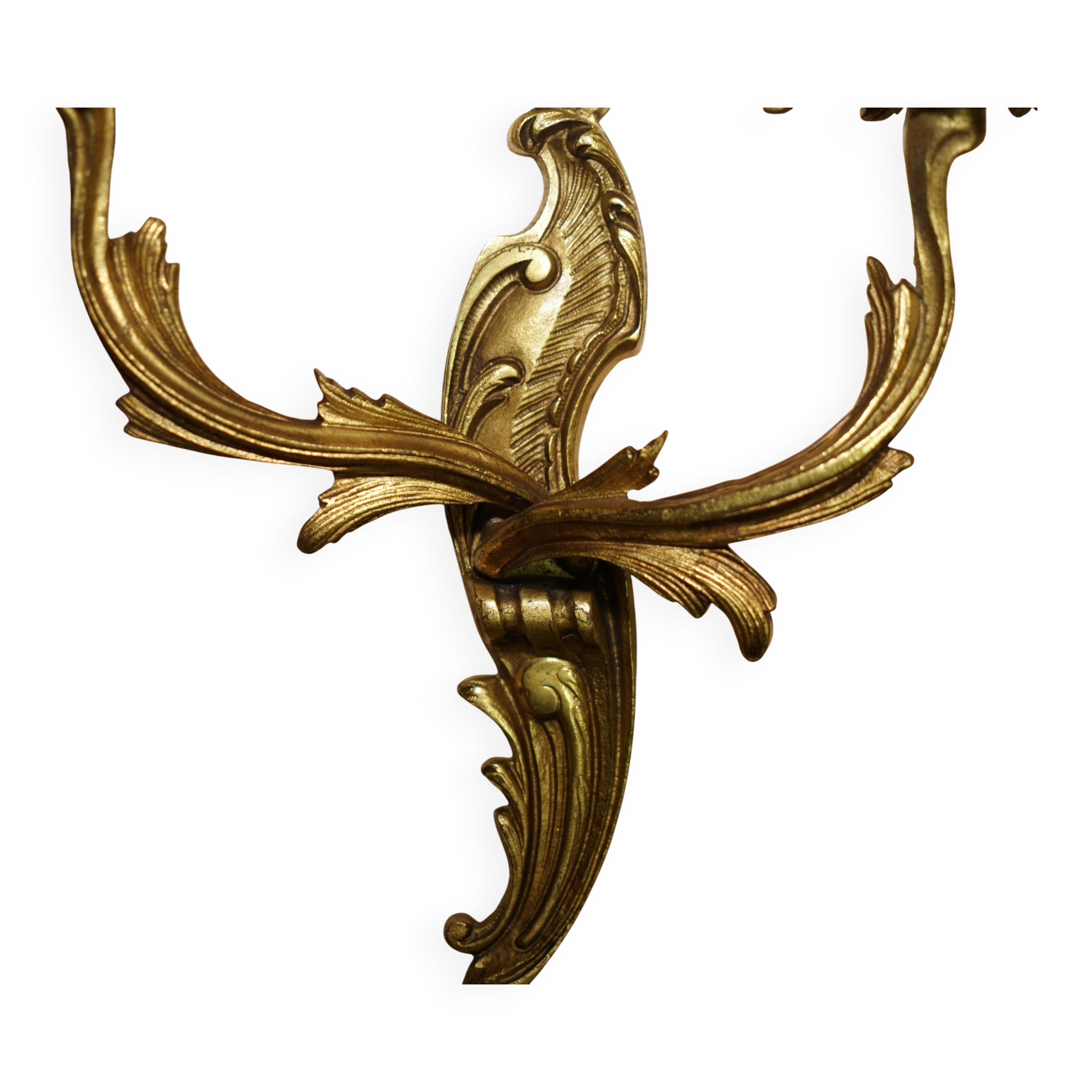 Pair of antique French wall sconces, gilded and bronzed, from the 1920s.