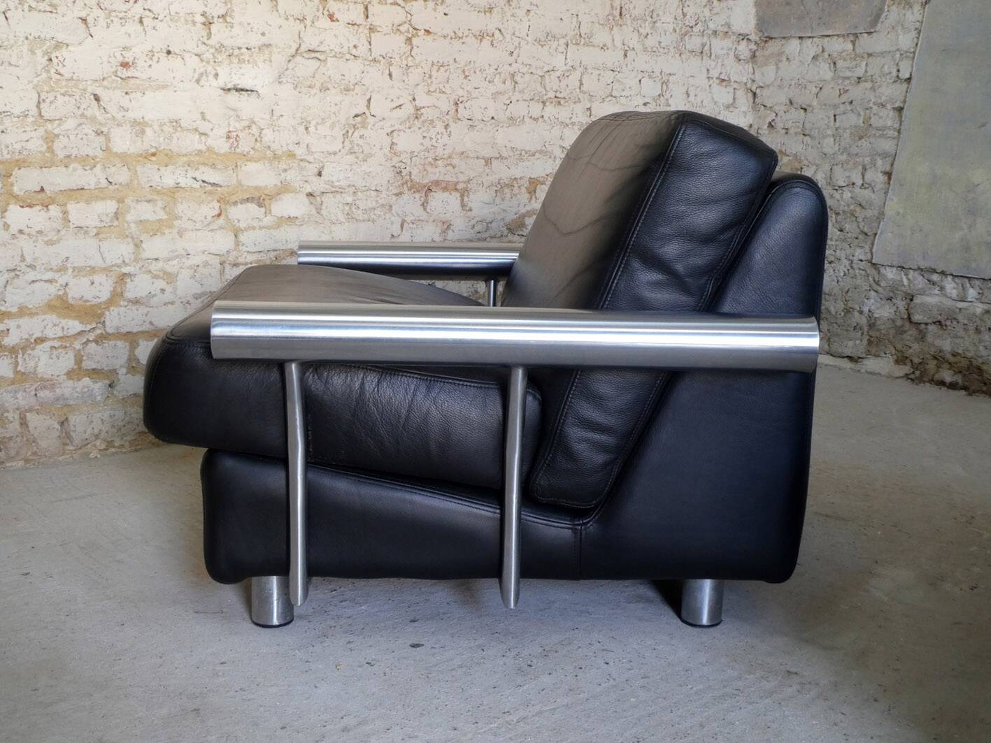 pair of armchairs, black leather & stainless steel, 1990