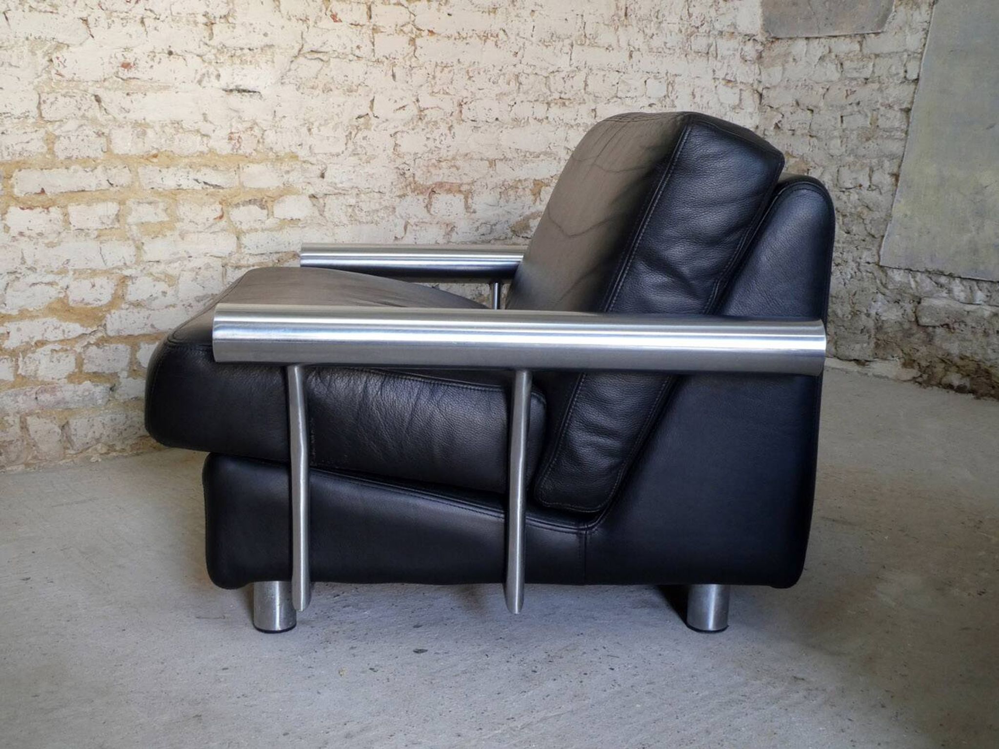 pair of armchairs, black leather & stainless steel, 1990