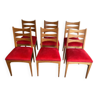 Set of 6 oak chairs with red velvet seats.