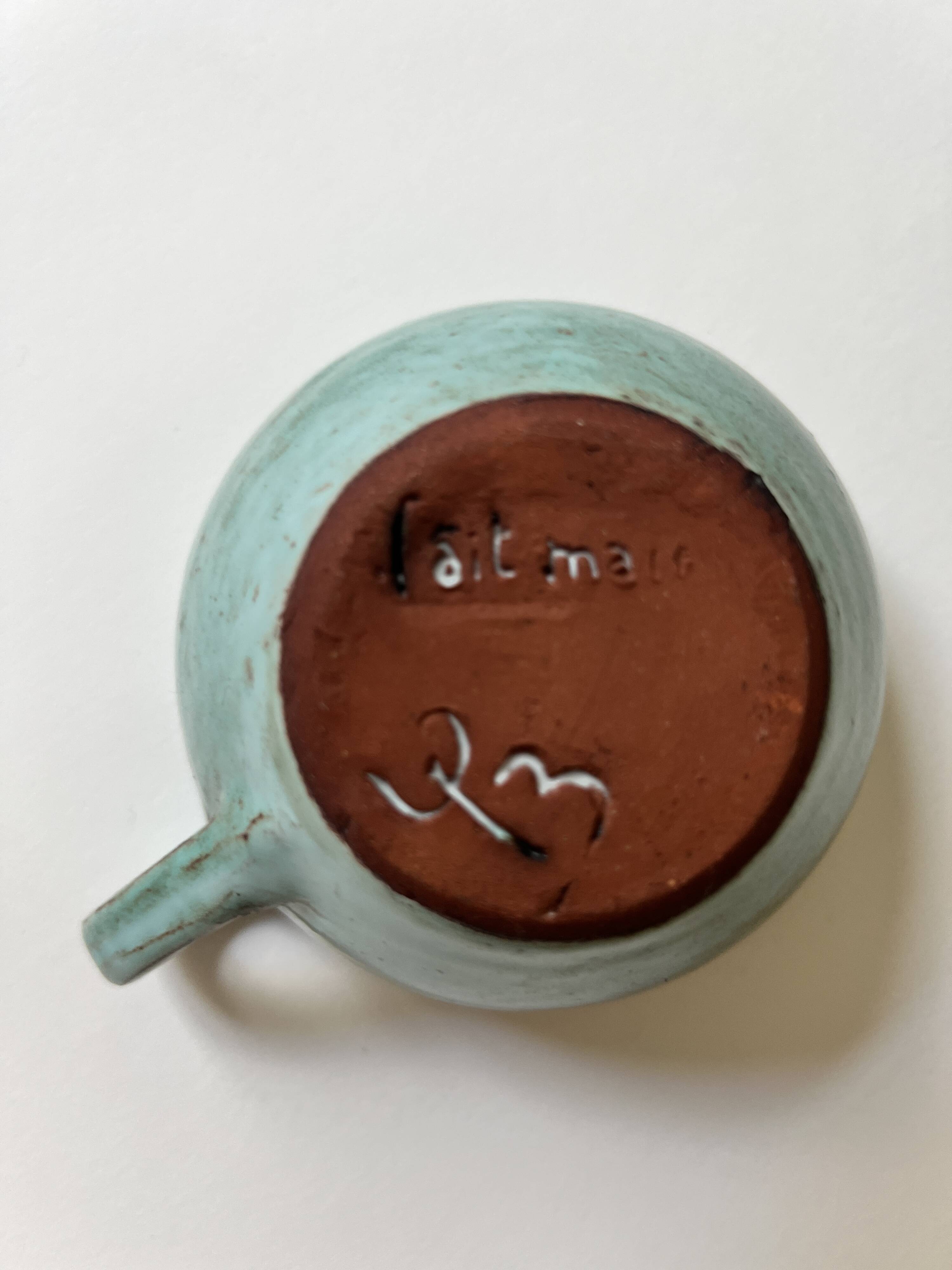 Handmade and signed glazed ceramic coffee cups, circa 1950.