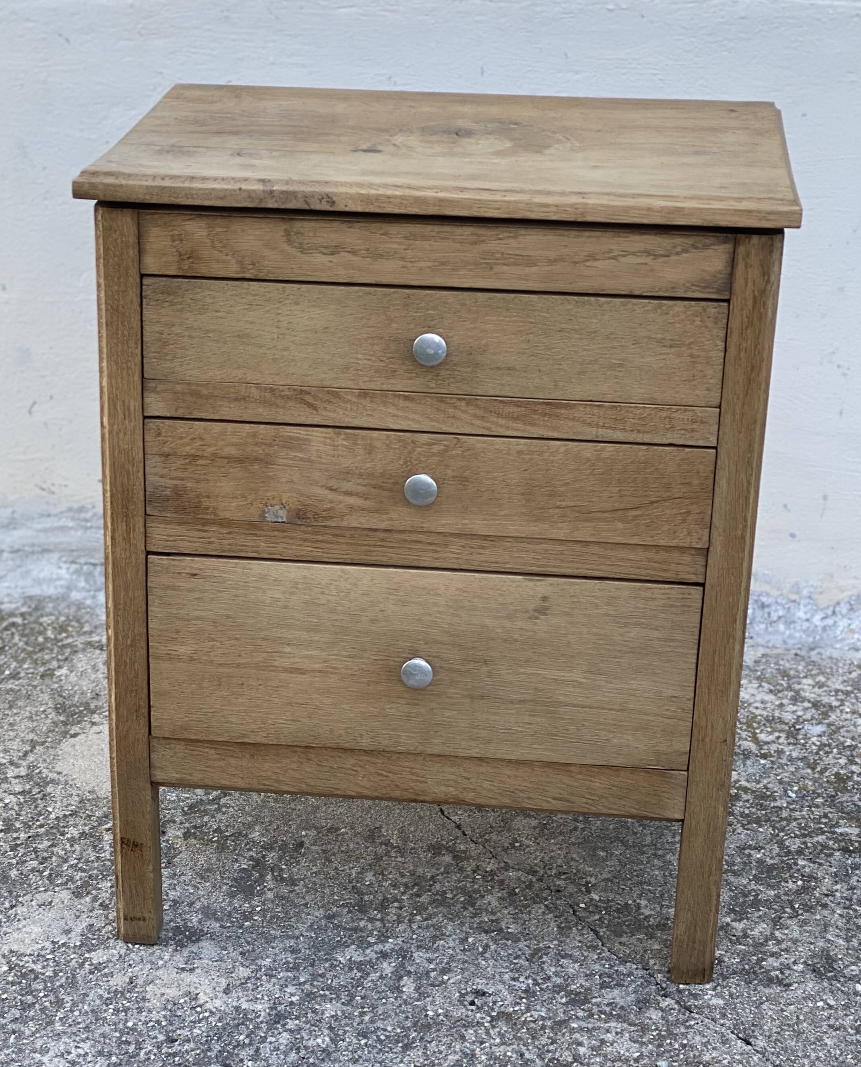 Small workshop cabinet with 3 stripped oak drawers.
