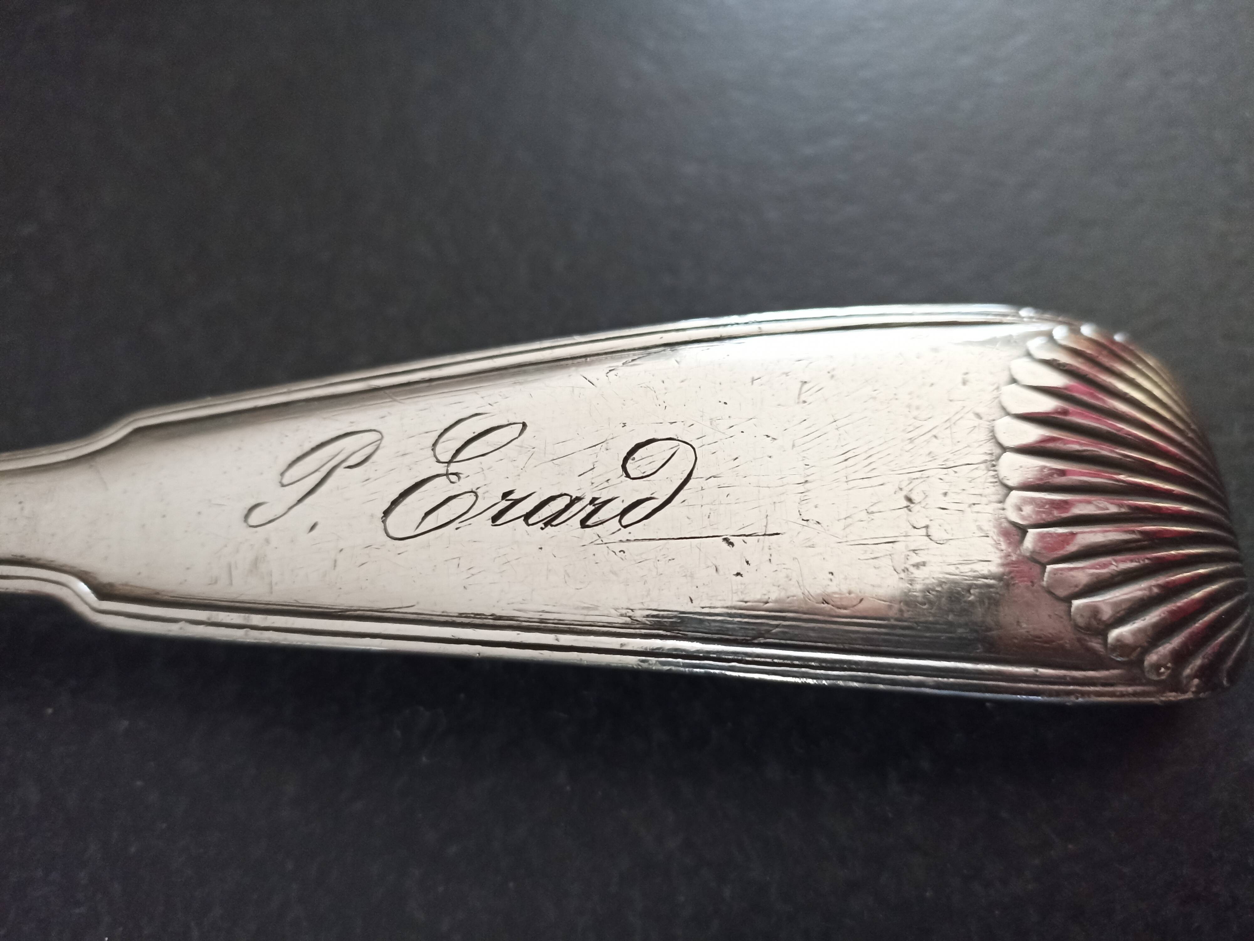 Silver metal serving spoon