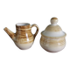 Sugar bowl and milk jug in Longchamp earthenware.