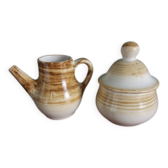 Sugar bowl and milk jug in Longchamp earthenware.