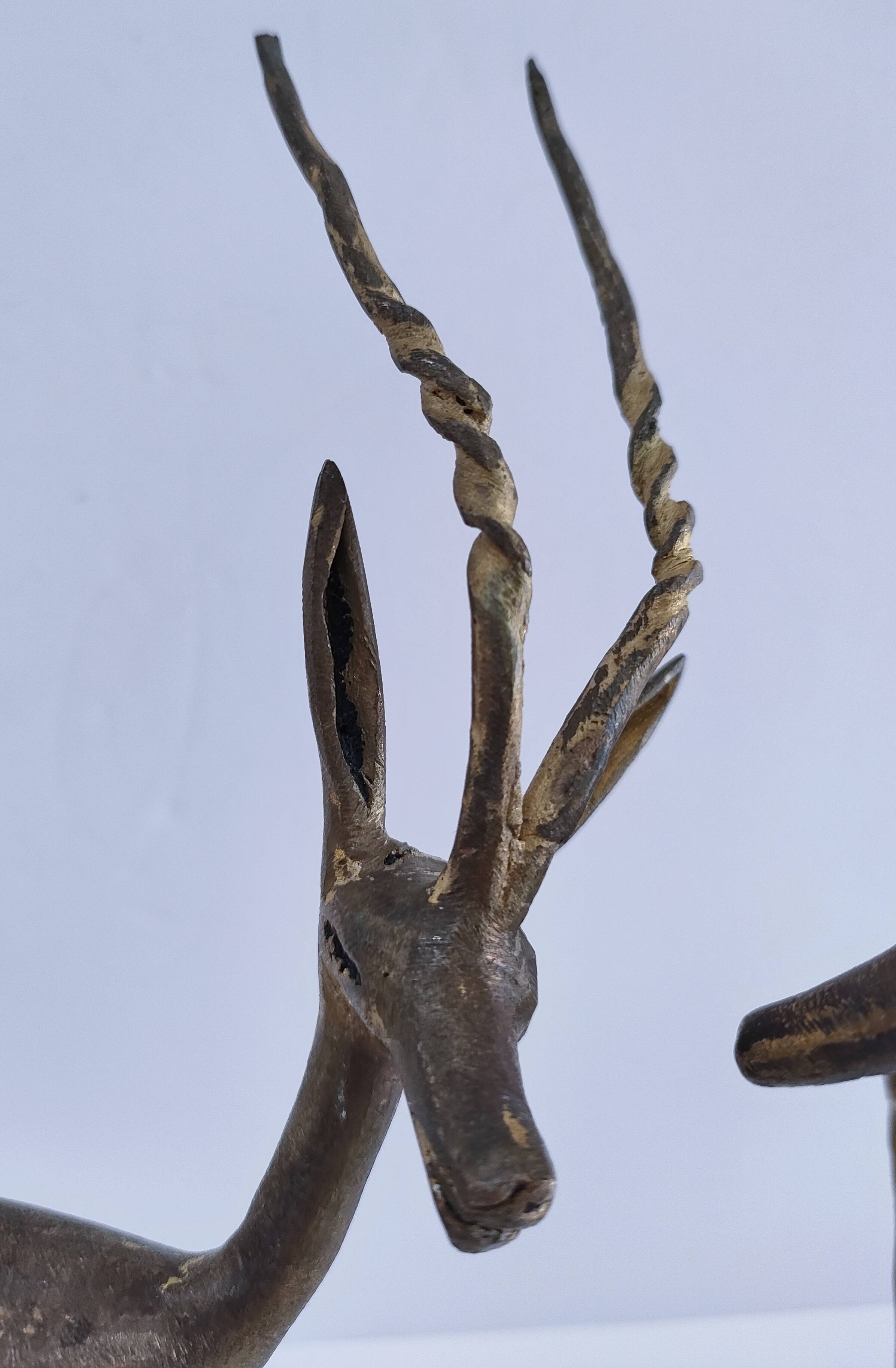 four vintage brass gazelle antelope sculptures