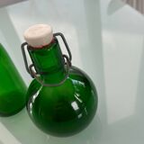 Duo of green bottles