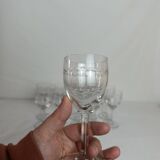 Set of 11 antique engraved crystal liqueur glasses.