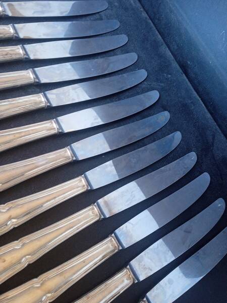 12 knives + silver metal punch from the 1950s