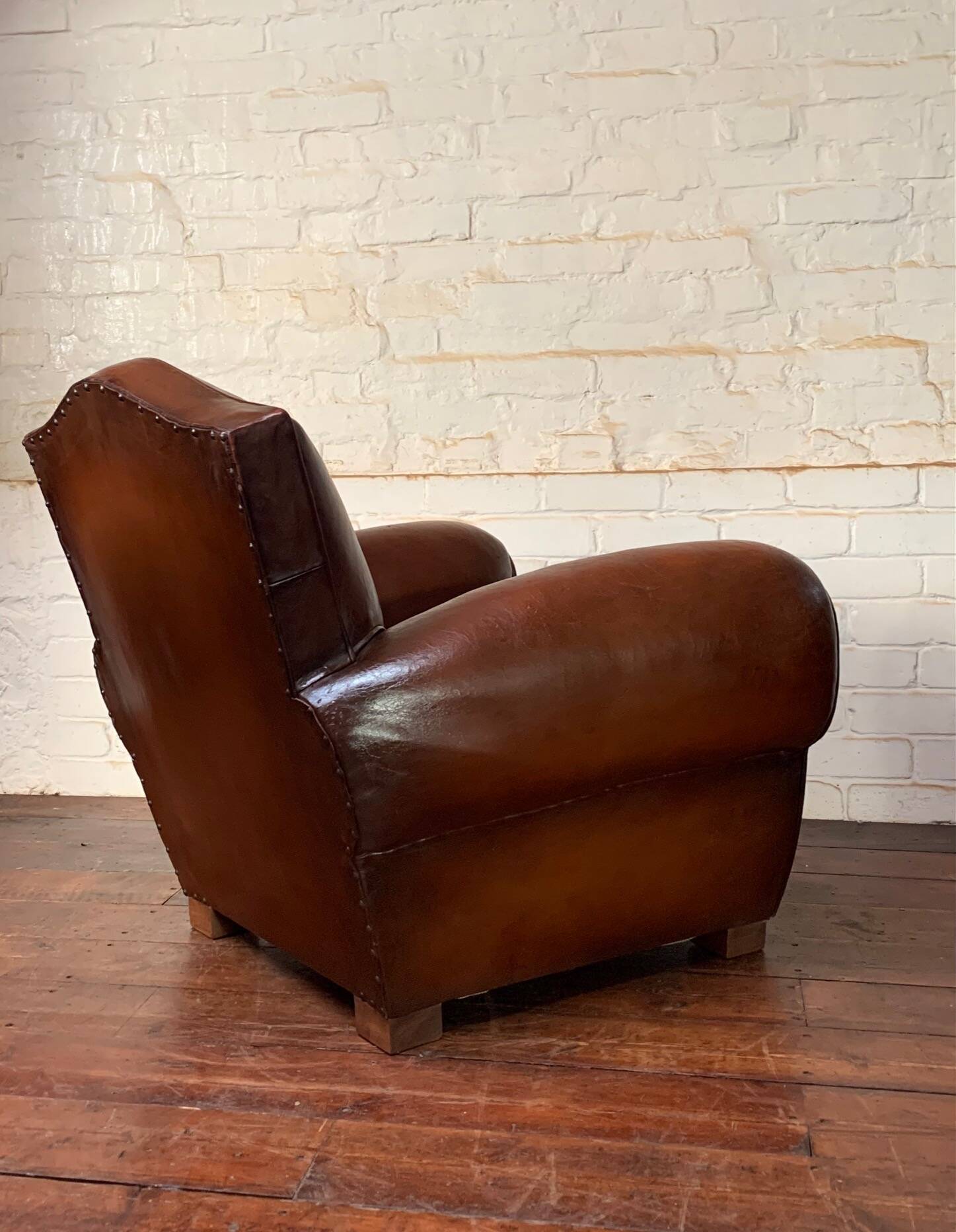 French leather club chair, chapeau de gendarme model circa 1950’s