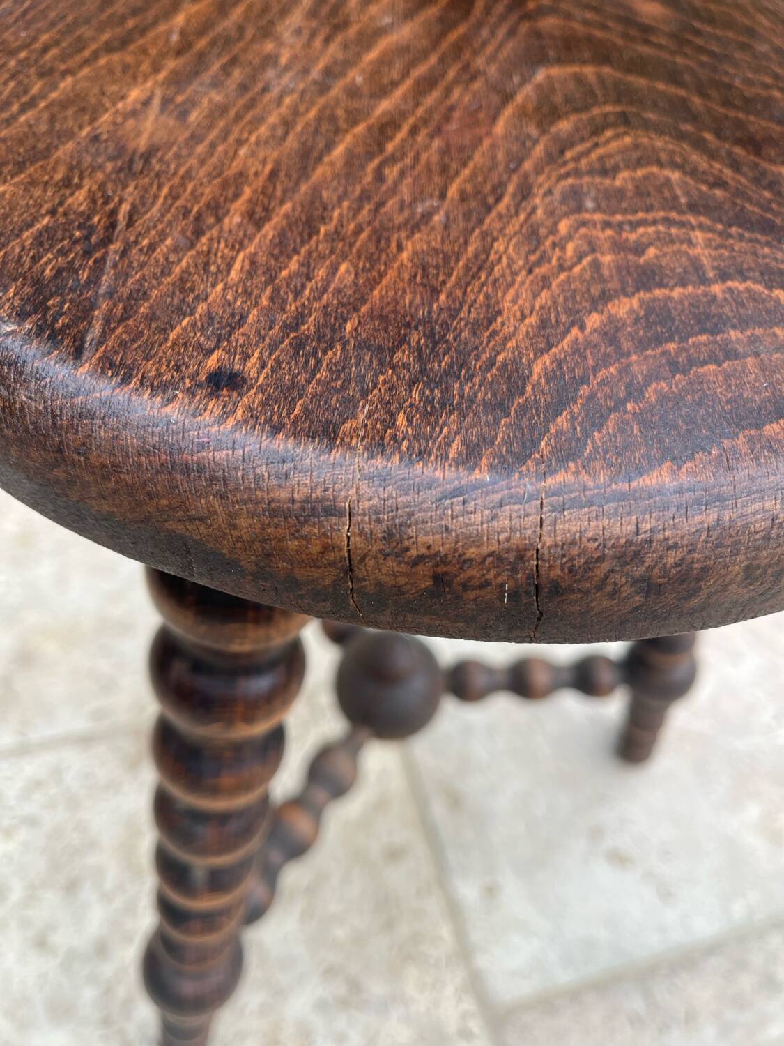 Signed turned wood tripod stool