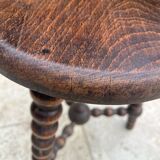 Signed turned wood tripod stool