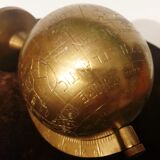 Old terrestrial globe in copper, brass