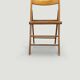 Vintage folding chair with caning.