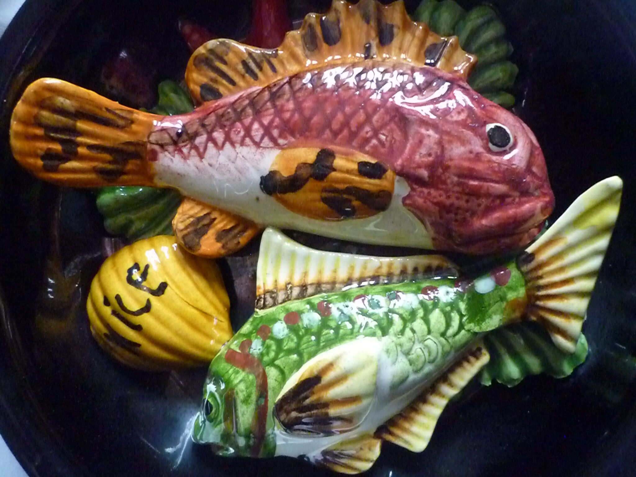 Plate caquelon in vintage slurry style Vallauris theme fish