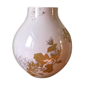 Pale pink and golden earthenware vase