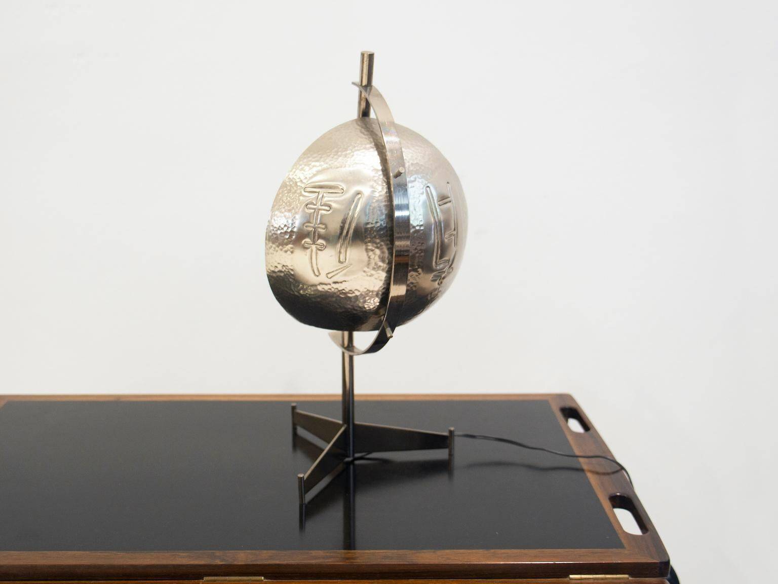 Metal table lamp with triangular glass light on tripod stand, 1970s.