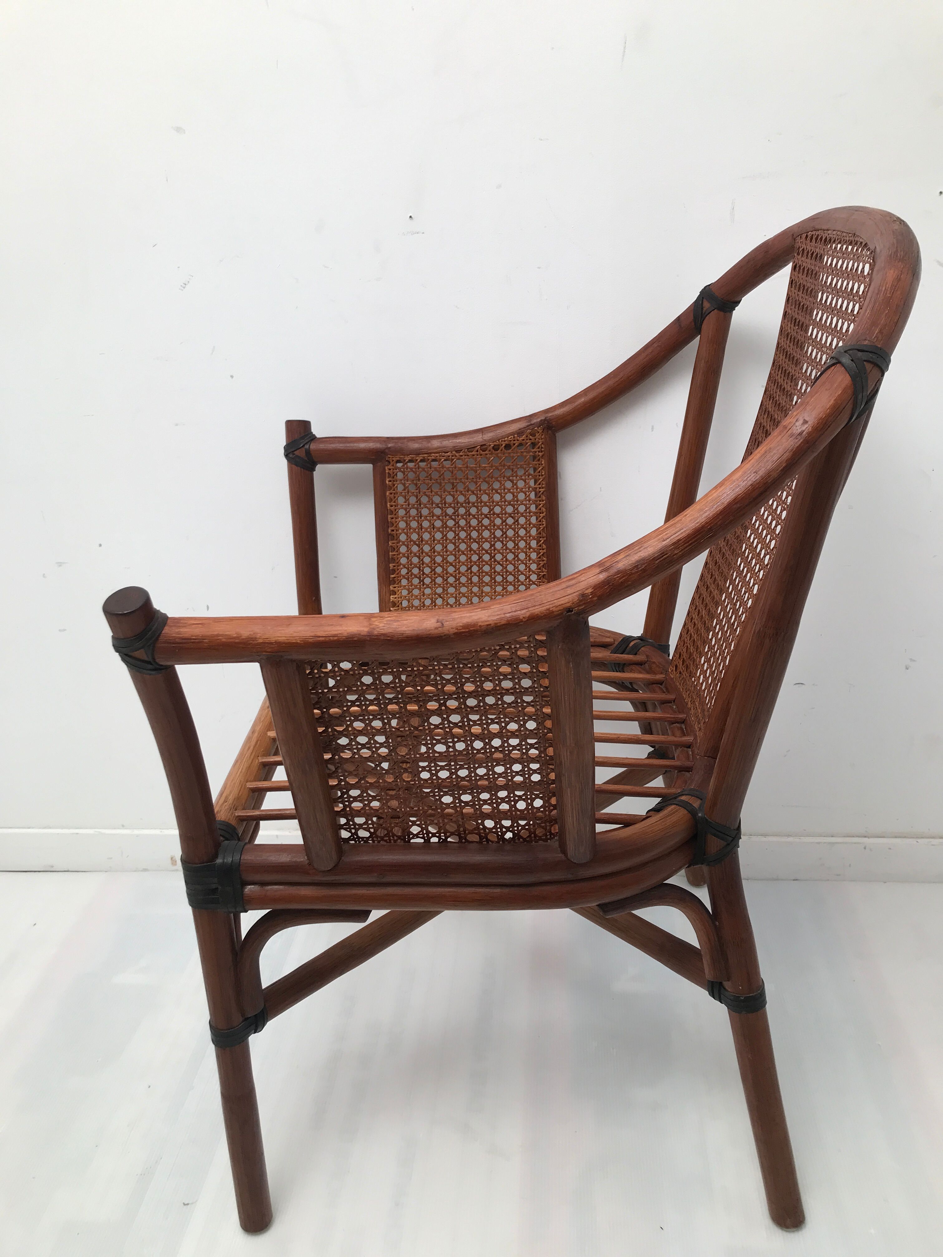 Rattan armchair with its footrest 70s