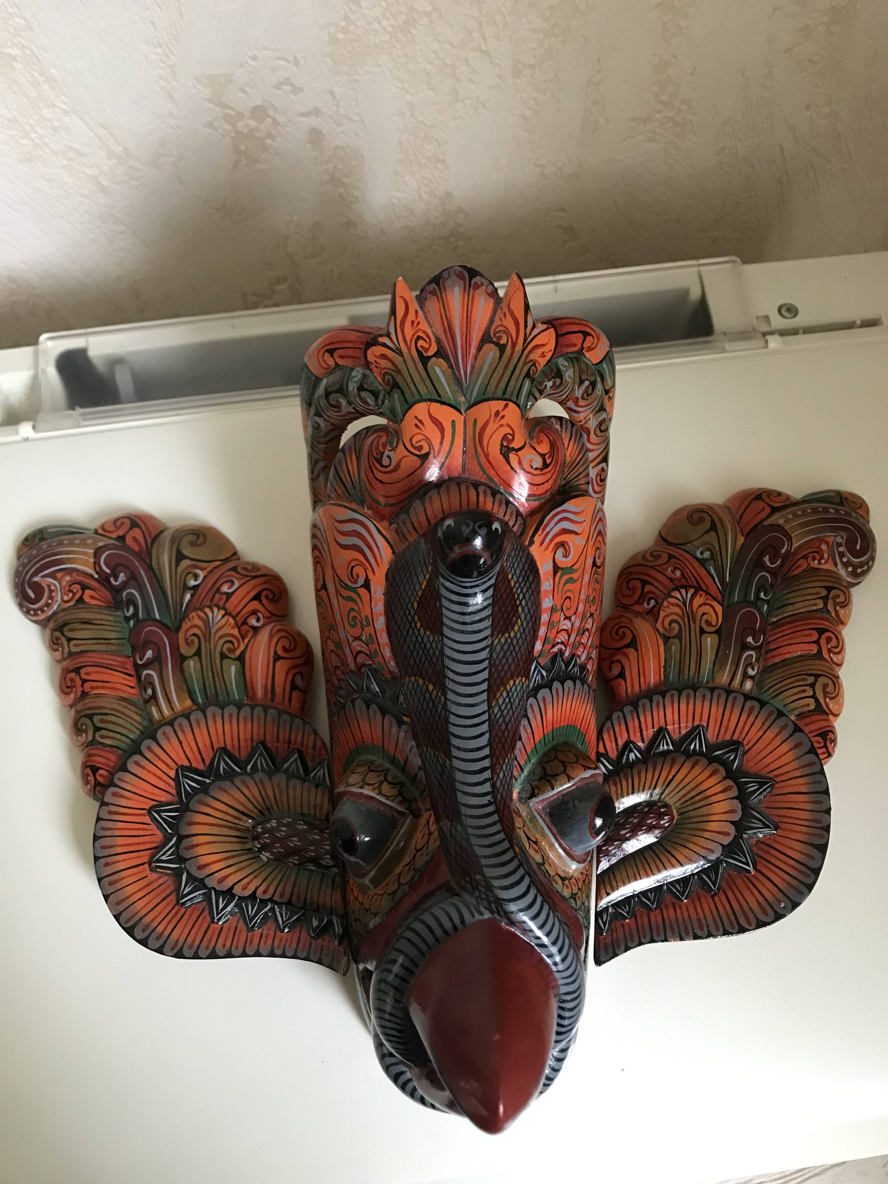 Wooden triptych mask